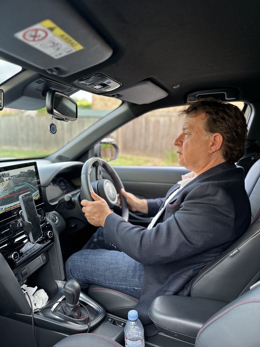 Eduart Pashaj, automatic driving instructor in Barnes SW London, at the wheel of his Toyota Yaris Hybrid
